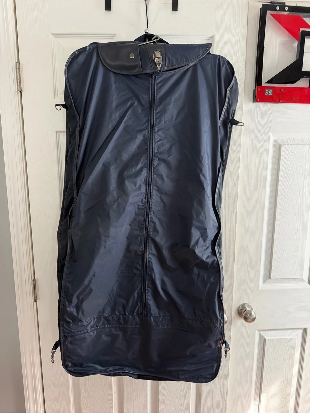American Tourister Black Garment Bag with Red Zipper Accent